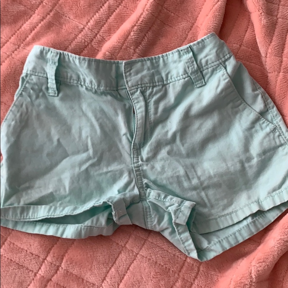 Little girls teal shorts.